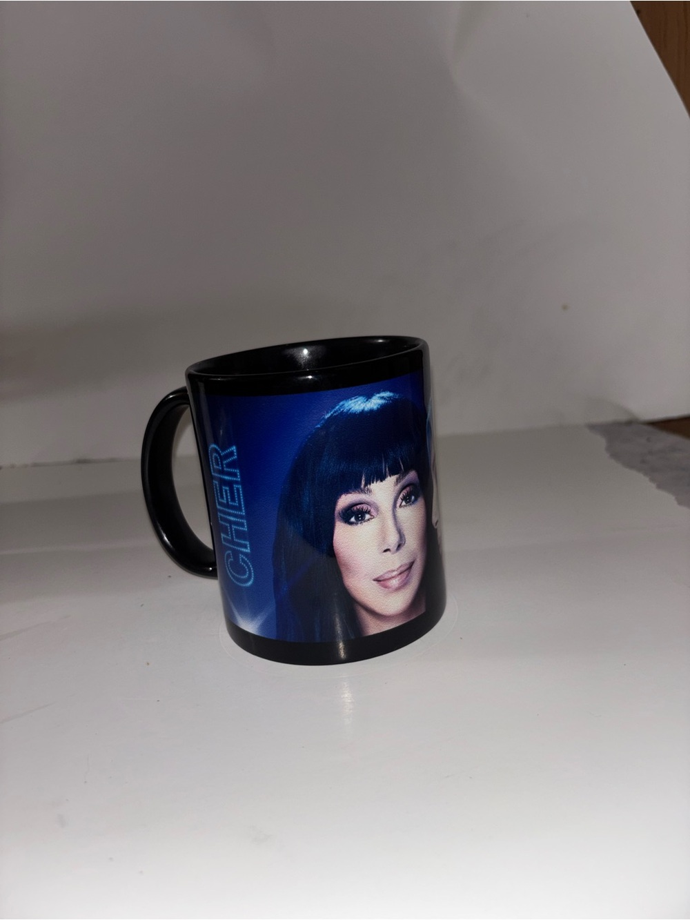 Black Hair Accessory Mug with Blue Graphic